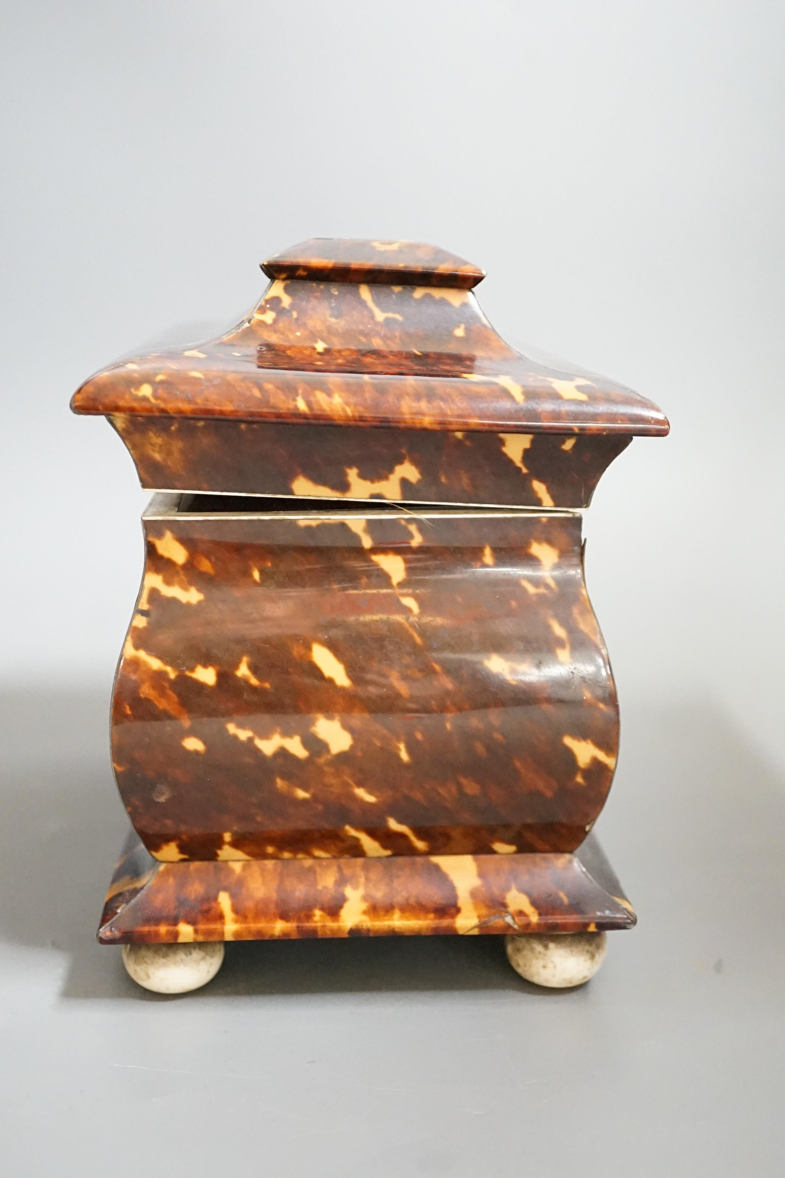 A Victorian tortoiseshell and ivory mounted tea caddy, 18cms high